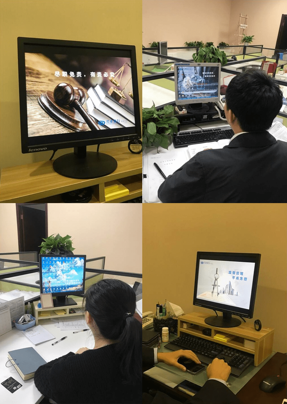 各分行办公电脑加载  合规内控主题屏保照片