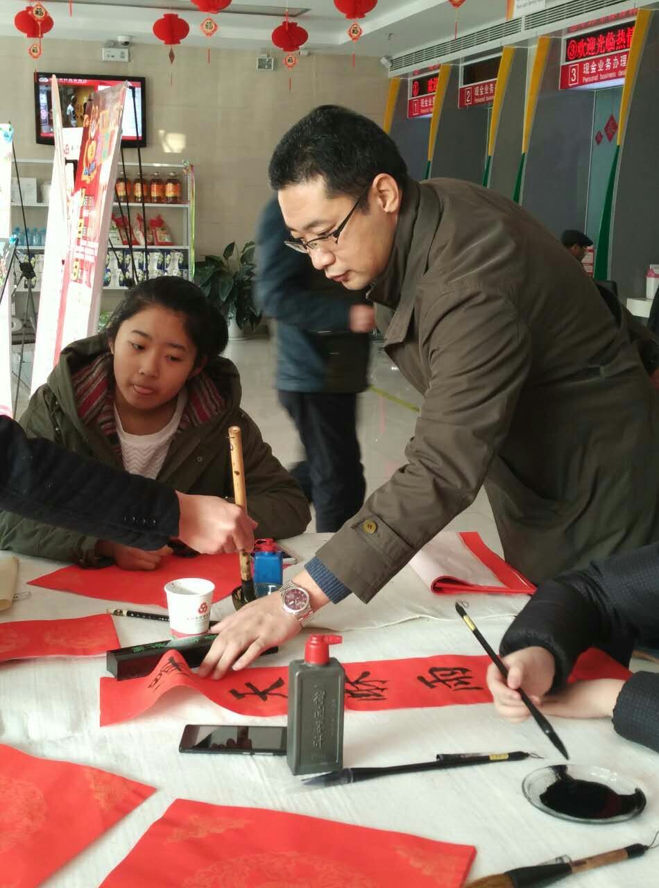 刘慧龙书法学校"迎新春写春联送福字"活动